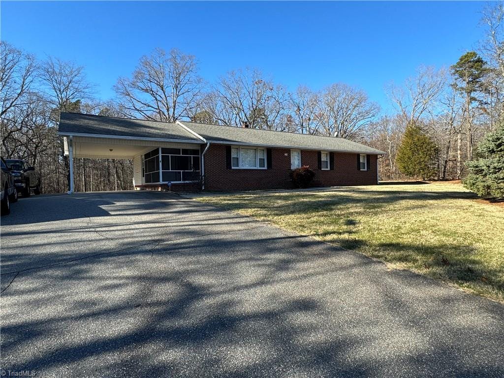 Exterior photo of 7264 Doral Drive, Tobaccoville NC 27050. MLS: 1127650