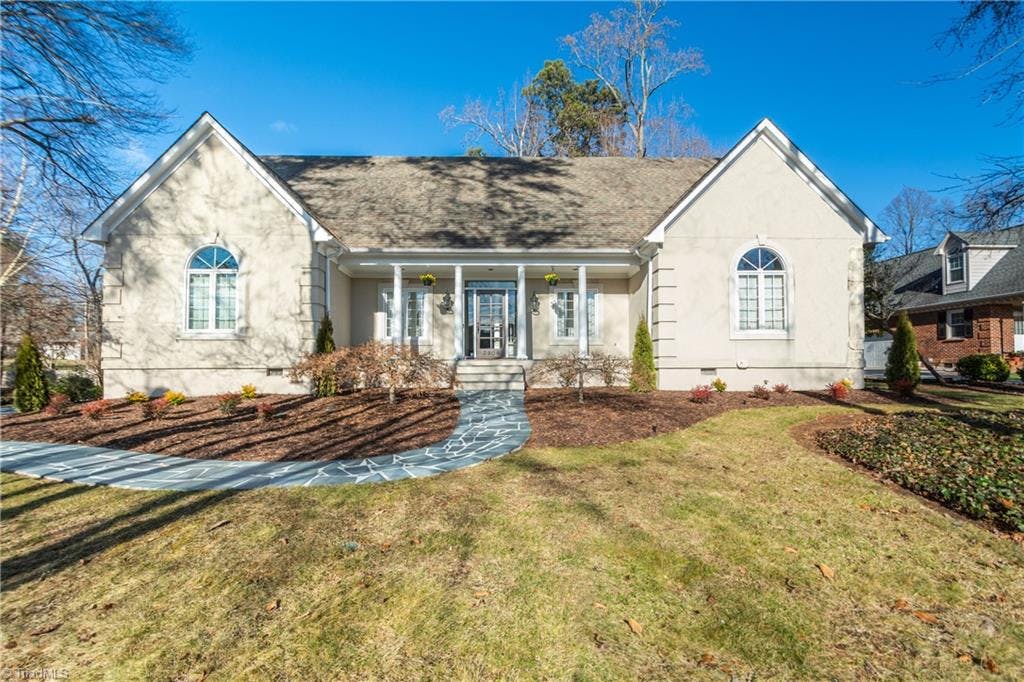 Welcome home to 3906 Gaston Drive.  This charming 4 BR, 3 1/2 BA home is nestled on .68 acres in the Sedgefield Country Club golf community.