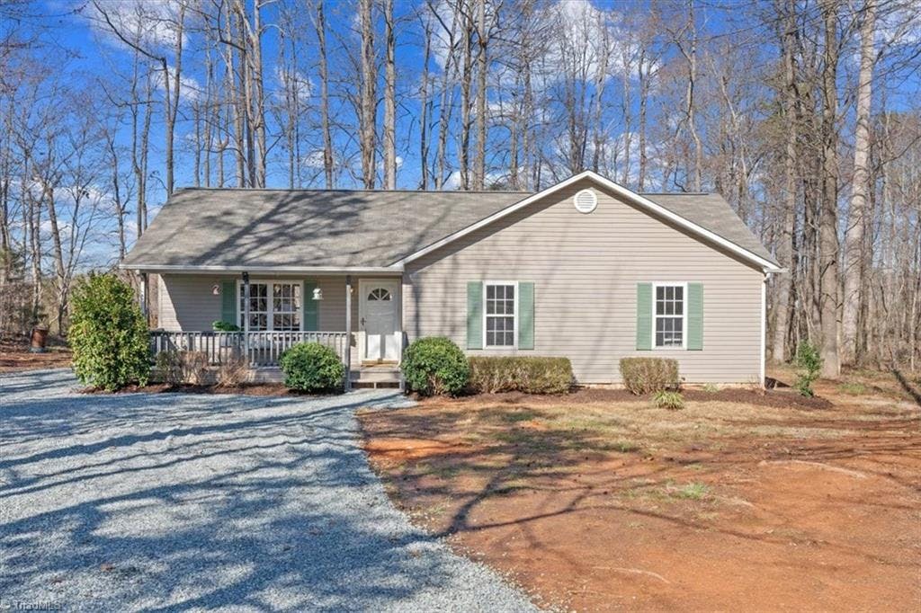 Exterior photo of 6521 Whites Chapel Road, Staley NC 27355. MLS: 1134832