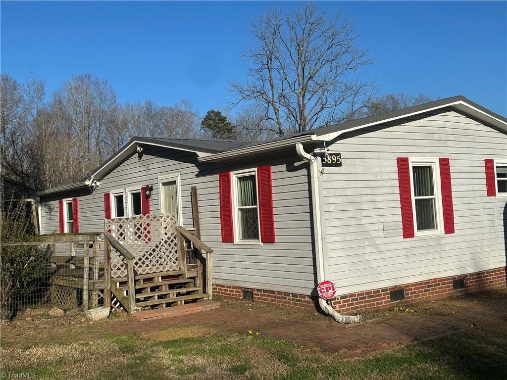 Exterior photo of 5895 Bethania Tobaccoville Road, Pfafftown NC 27040. MLS: 1136315