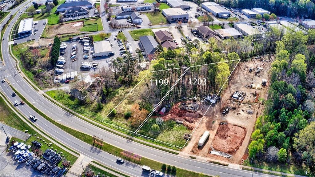 Exterior photo of 1203 & 1199 Brawley School Road, Mooresville NC 28117. MLS: 1136913
