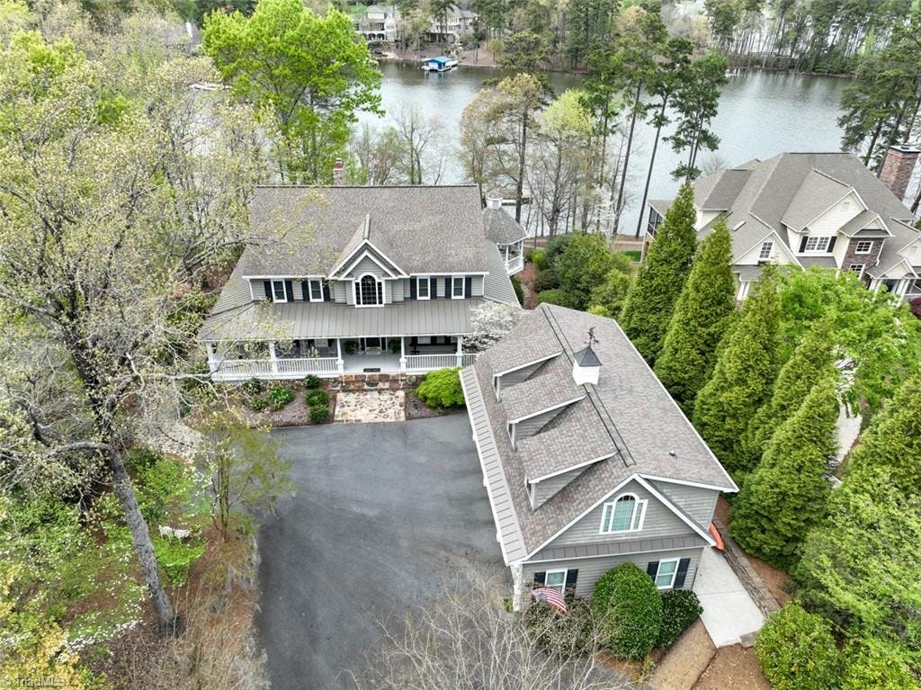 Aerial Front View of Home and Lake
