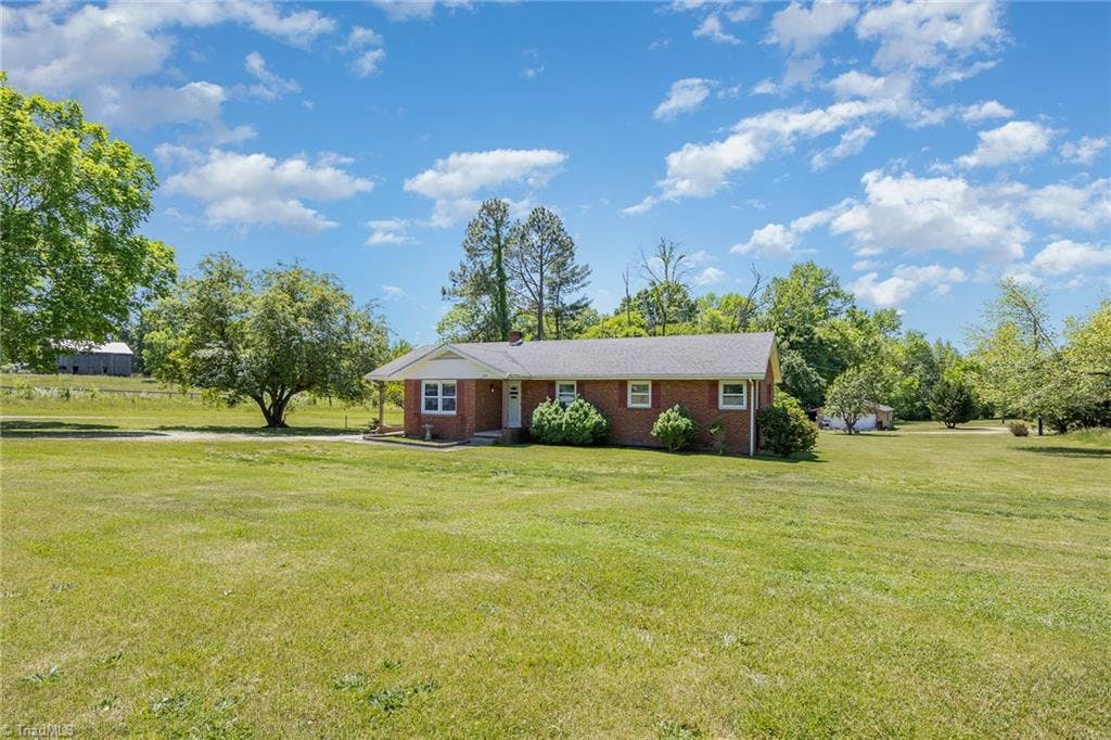 Exterior photo of 1978 Mount Hope Church Road, McLeansville NC 27301. MLS: 1140642